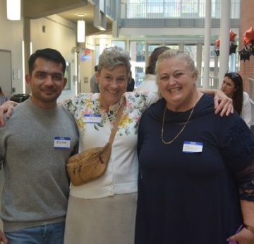 Students smiling with Professor
